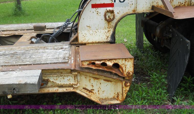 image for item 7872 1995 White GMC Aero WIA semi truck with triple axle trailer