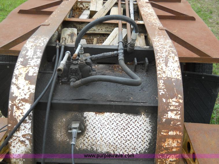 image for item 7872 1995 White GMC Aero WIA semi truck with triple axle trailer