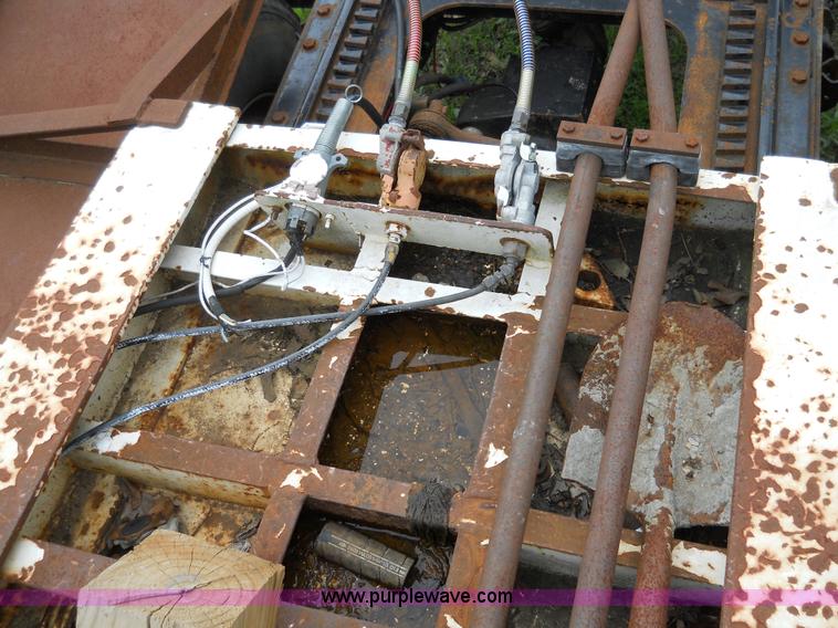 image for item 7872 1995 White GMC Aero WIA semi truck with triple axle trailer