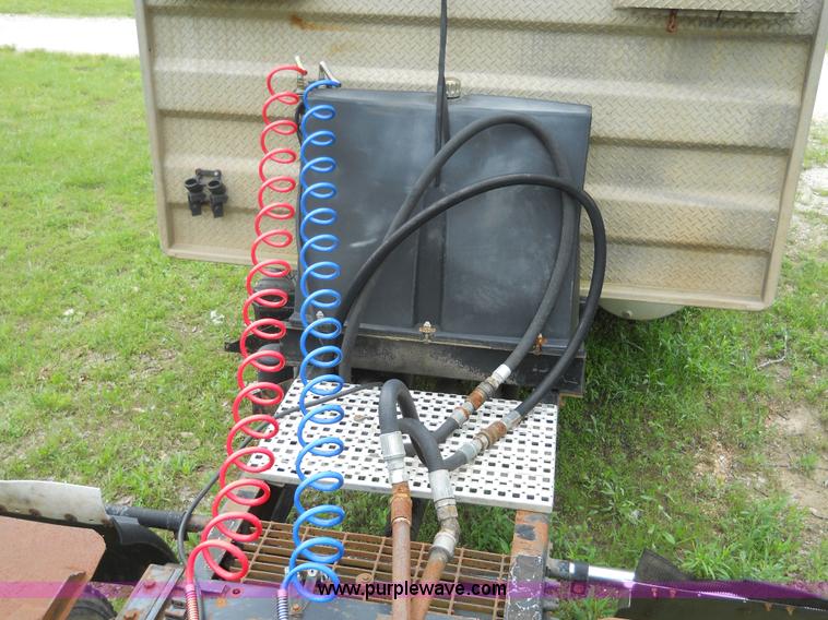 image for item 7872 1995 White GMC Aero WIA semi truck with triple axle trailer