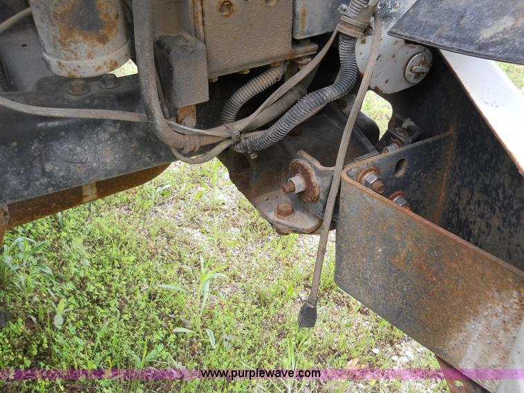 image for item 7872 1995 White GMC Aero WIA semi truck with triple axle trailer