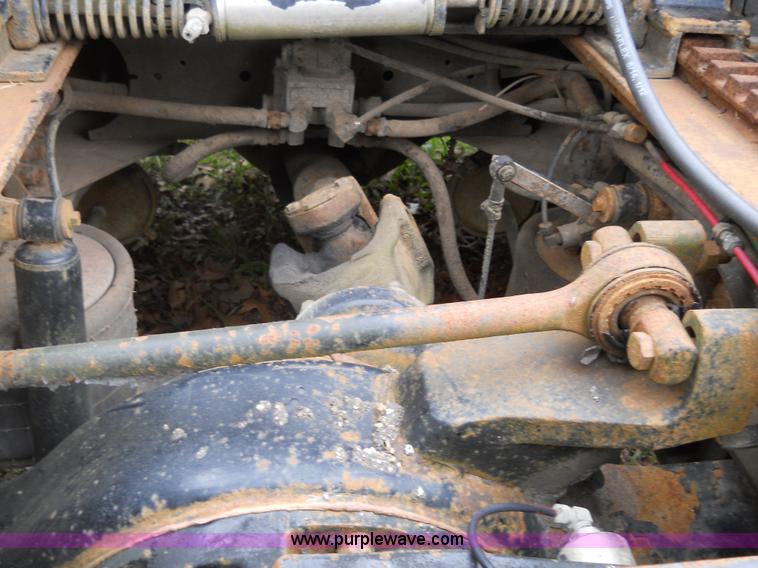 image for item 7872 1995 White GMC Aero WIA semi truck with triple axle trailer