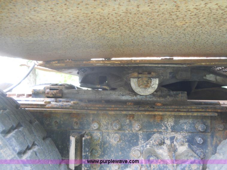 image for item 7872 1995 White GMC Aero WIA semi truck with triple axle trailer