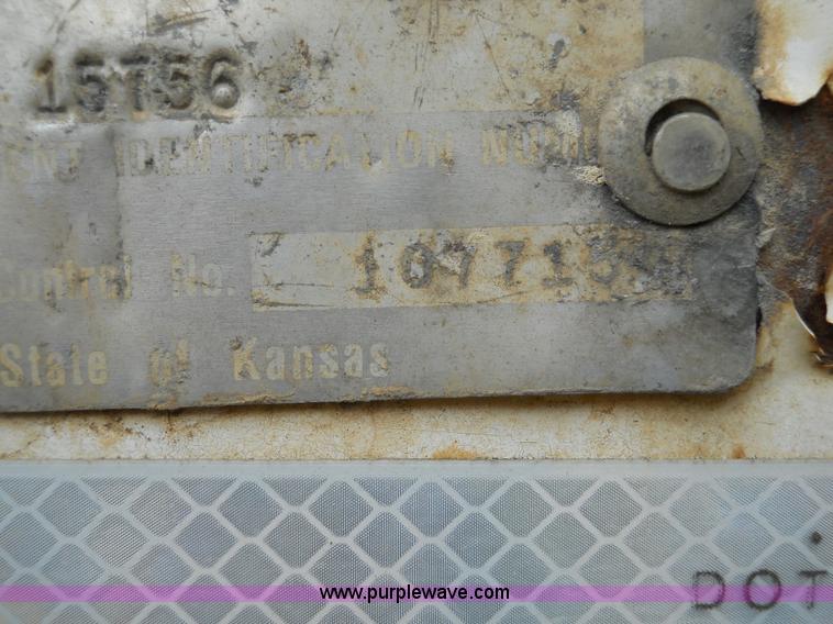 image for item 7872 1995 White GMC Aero WIA semi truck with triple axle trailer