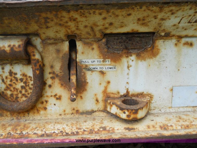 image for item 7872 1995 White GMC Aero WIA semi truck with triple axle trailer