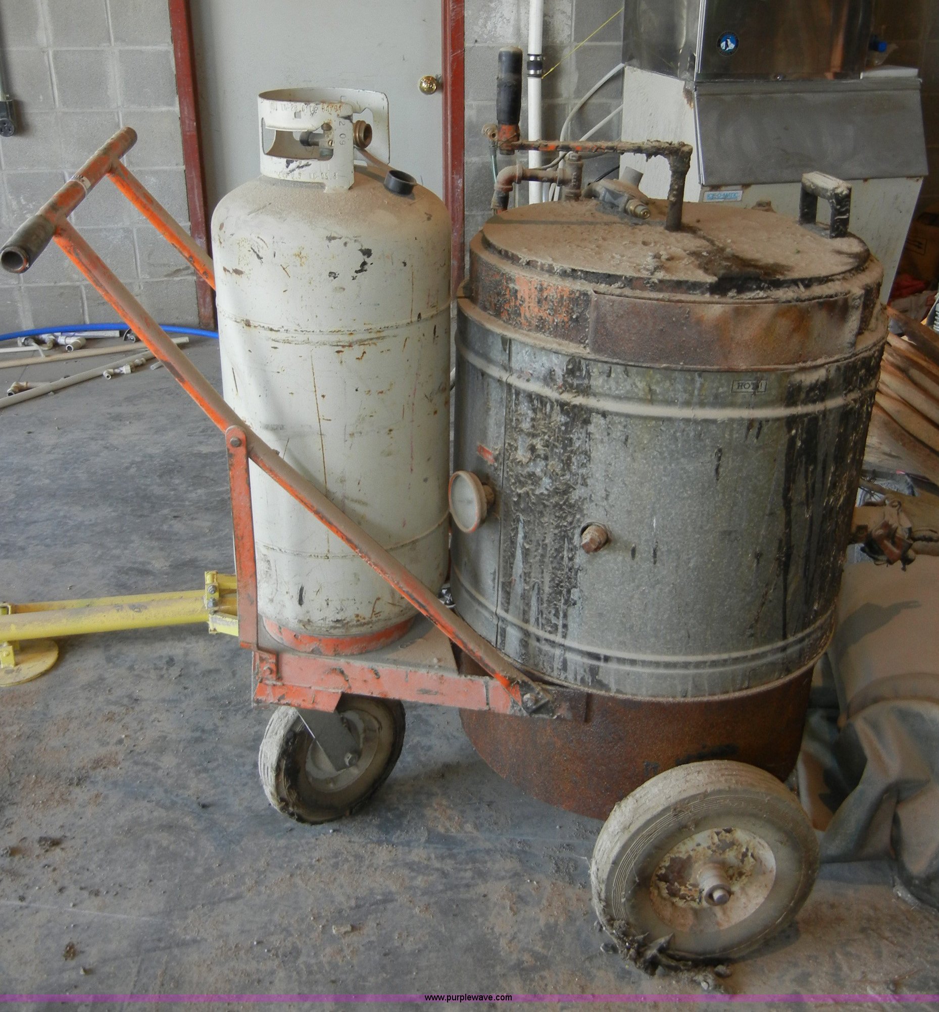 Hot tar pot in Burlingame, KS Item 2169 sold Purple Wave