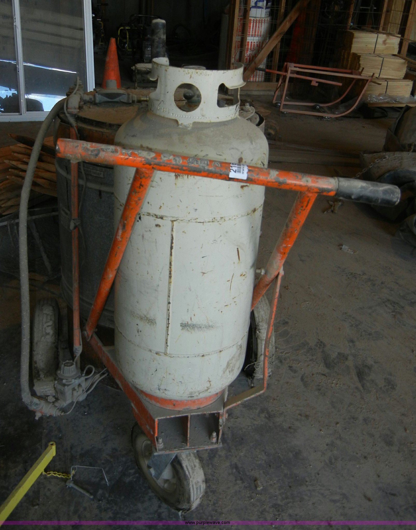 Hot tar pot in Burlingame, KS Item 2169 sold Purple Wave