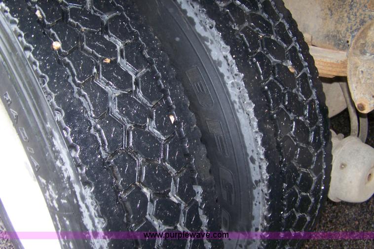 image for item 7371 1989 Freightliner FLD120 truck with dump bed