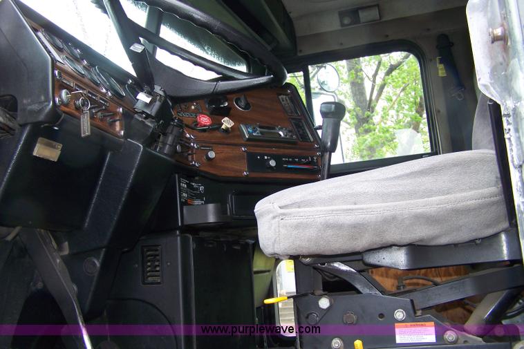 image for item 7371 1989 Freightliner FLD120 truck with dump bed