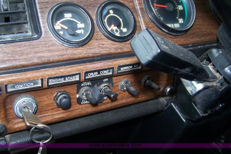 image for item 7371 1989 Freightliner FLD120 truck with dump bed