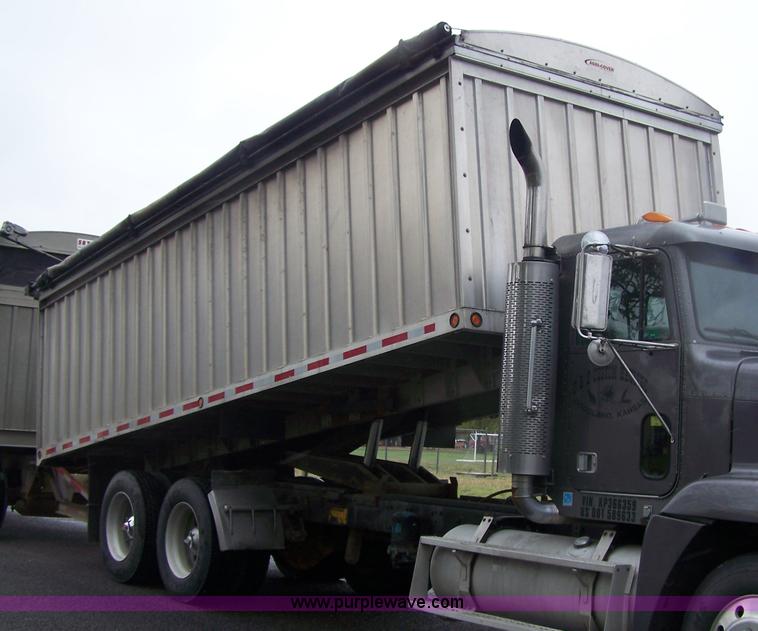 image for item 7371 1989 Freightliner FLD120 truck with dump bed
