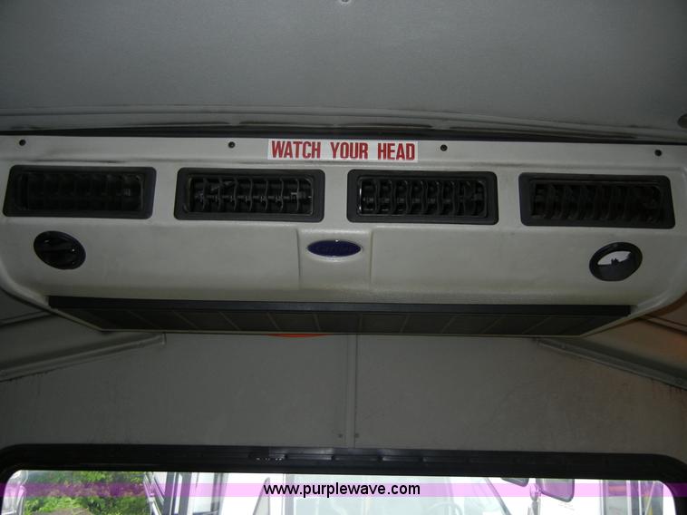 image for item 2250 2003 Ford E450 Super Duty 22 passenger bus