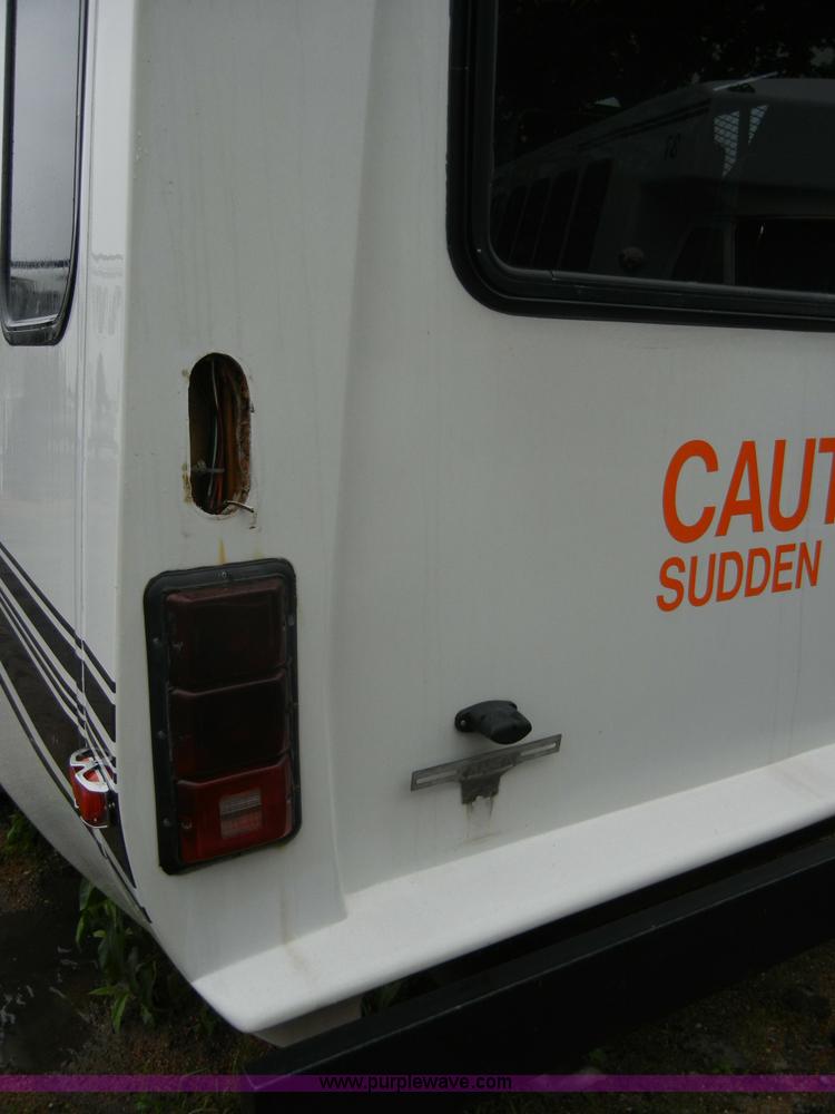 image for item 2250 2003 Ford E450 Super Duty 22 passenger bus