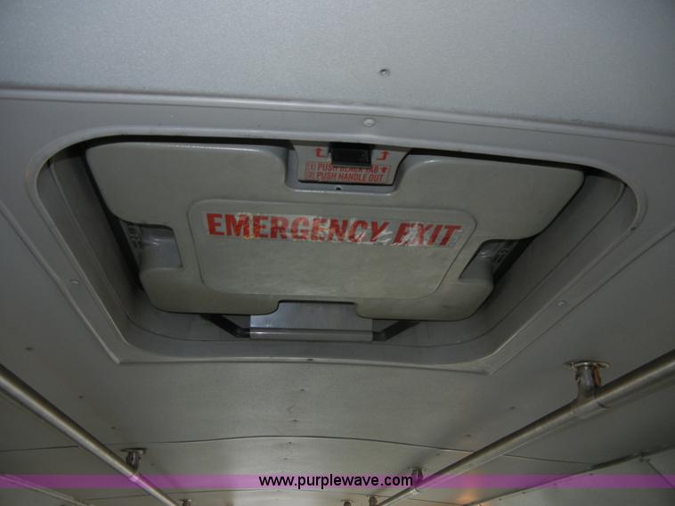 image for item 2251 2003 Ford E450 Super Duty 22 passenger bus