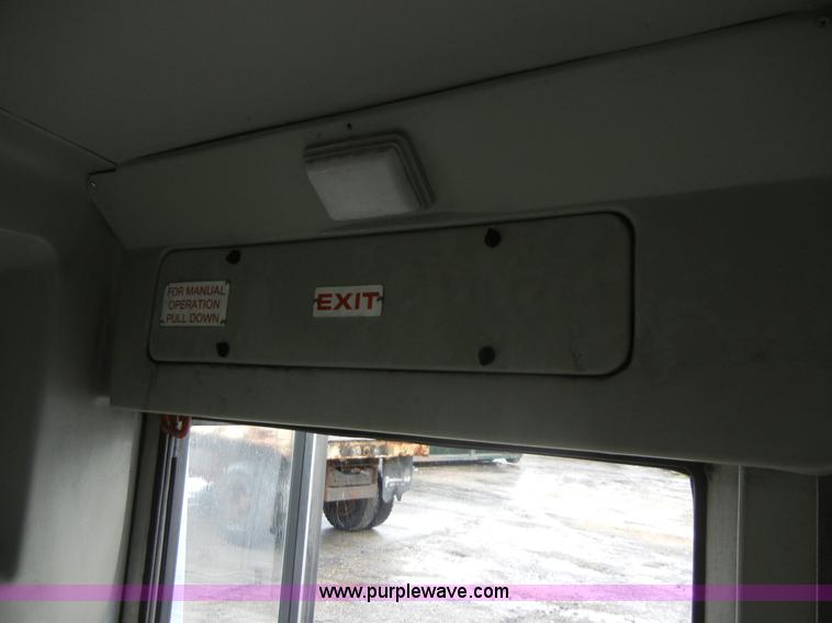 image for item 2251 2003 Ford E450 Super Duty 22 passenger bus