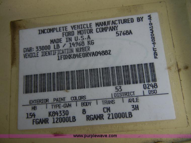 image for item 2252 1994 Ford F800 dump truck with sprayer