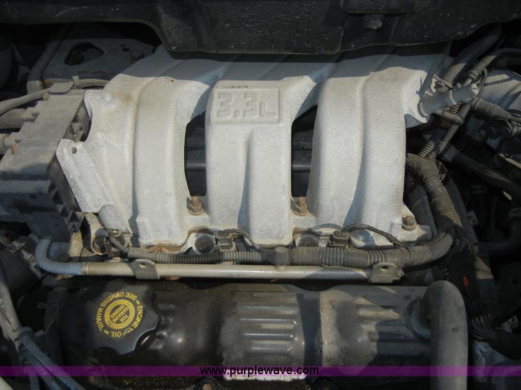 image for item 2403 1999 Plymouth Grand Voyager Expresso mini van