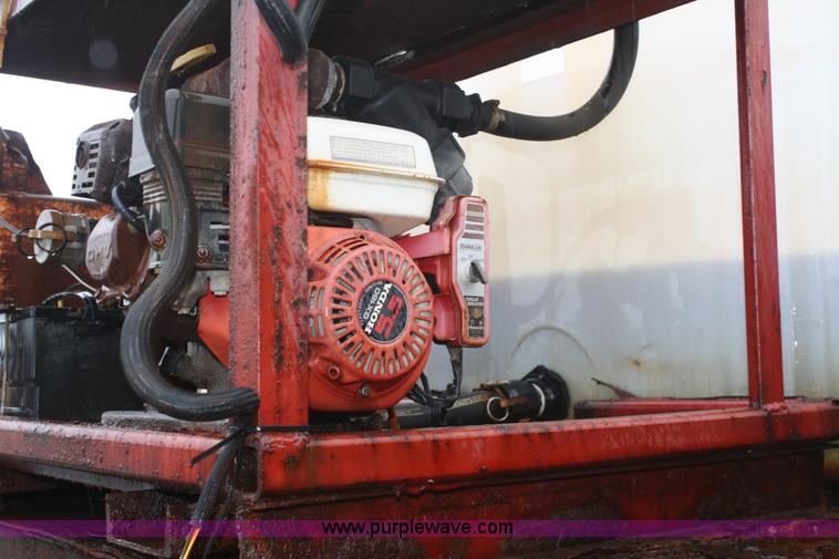 image for item 4653 1994 Ford F800 dump truck with sprayer