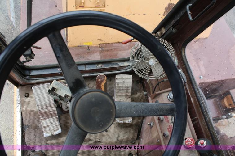 image for item 4660 Case 1085 Cruz air wheel excavator