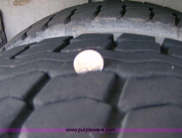 image for item 1001 1991 International 8300 flatbed semi truck with truck mounted forklift