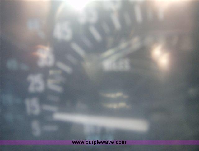 image for item 1001 1991 International 8300 flatbed semi truck with truck mounted forklift