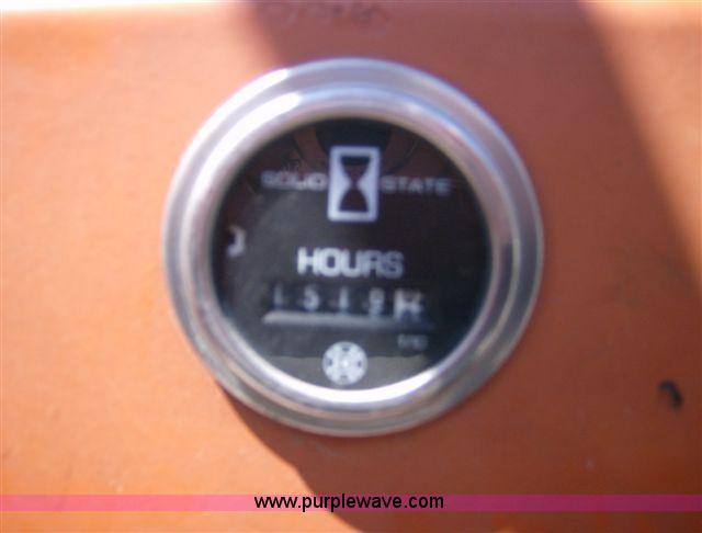 image for item 1001 1991 International 8300 flatbed semi truck with truck mounted forklift