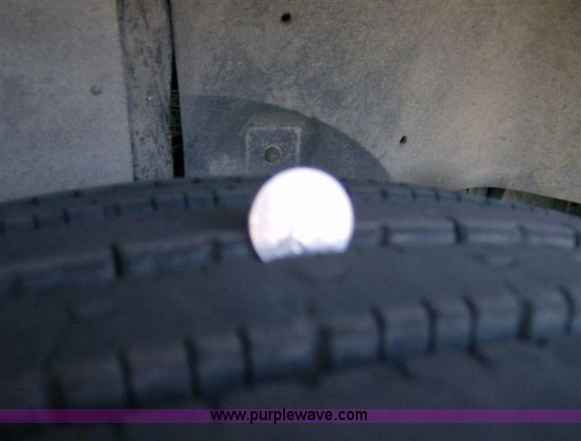 image for item 1001 1991 International 8300 flatbed semi truck with truck mounted forklift