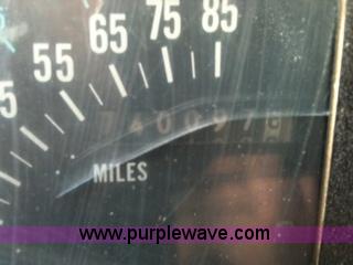 image for item 1001 1991 International 8300 flatbed semi truck with truck mounted forklift