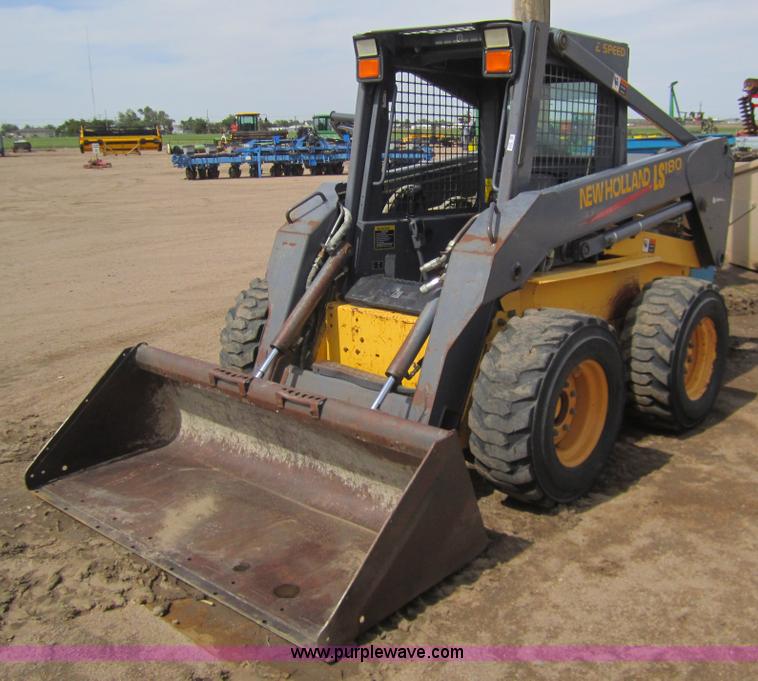 image for item 3134 2003 New Holland LS180 skid steer