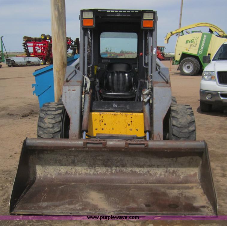 image for item 3134 2003 New Holland LS180 skid steer