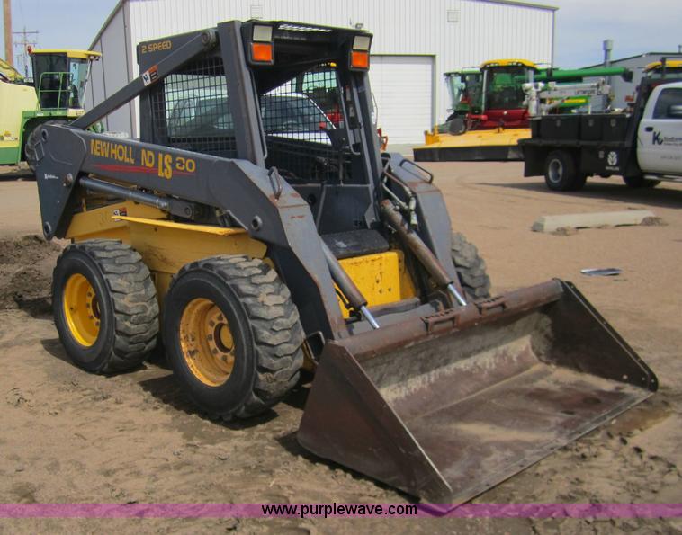 image for item 3134 2003 New Holland LS180 skid steer
