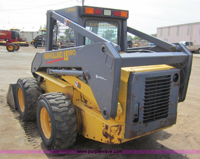 image for item 3134 2003 New Holland LS180 skid steer