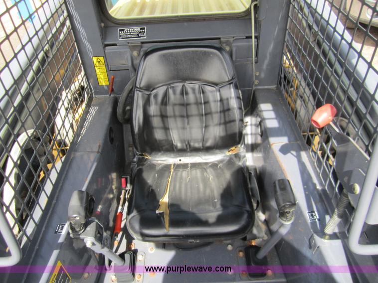 image for item 3134 2003 New Holland LS180 skid steer