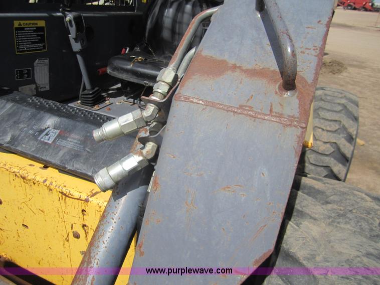 image for item 3134 2003 New Holland LS180 skid steer