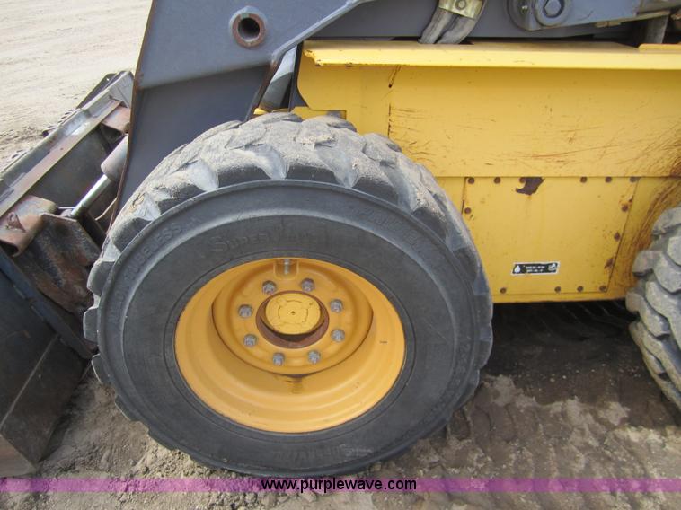 image for item 3134 2003 New Holland LS180 skid steer