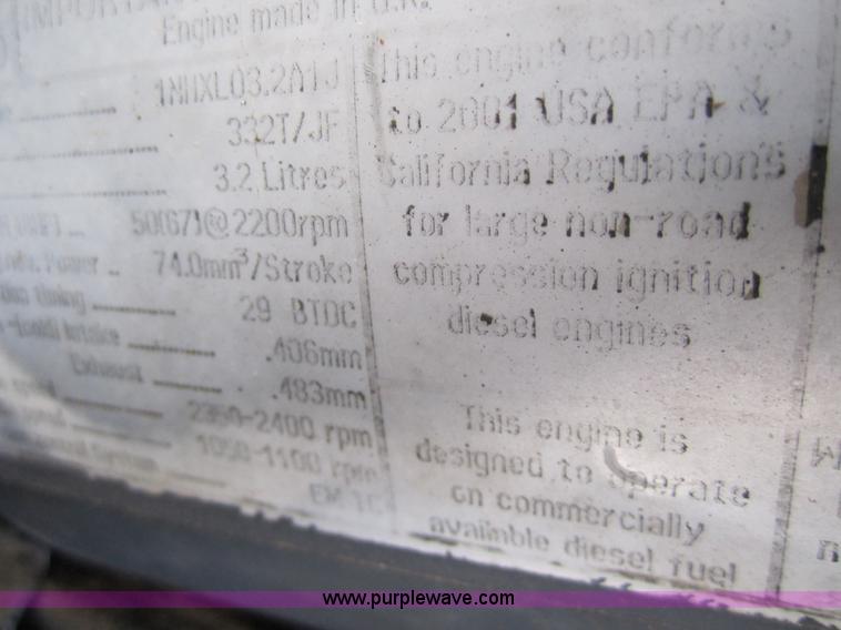 image for item 3134 2003 New Holland LS180 skid steer