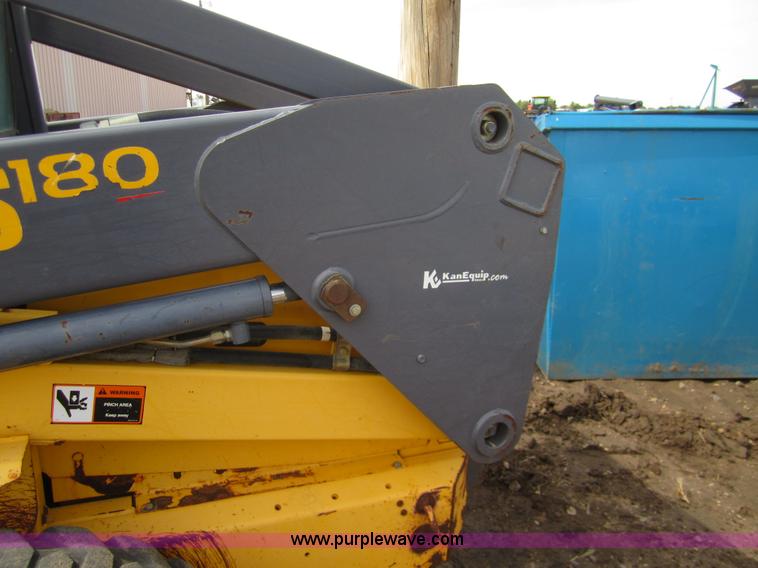 image for item 3134 2003 New Holland LS180 skid steer