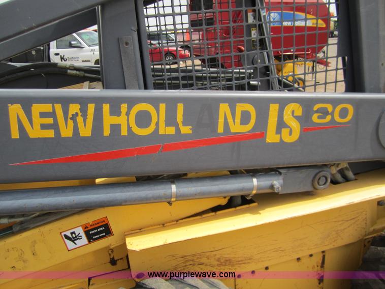 image for item 3134 2003 New Holland LS180 skid steer