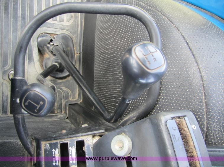 image for item 3171 1989 Ford TW-15 MFWD tractor