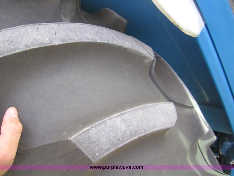 image for item 3171 1989 Ford TW-15 MFWD tractor