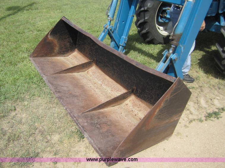 image for item 3171 1989 Ford TW-15 MFWD tractor