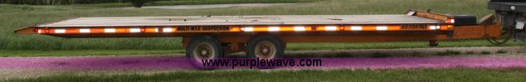 image for item 4667 1996 Econoline tilt bed trailer