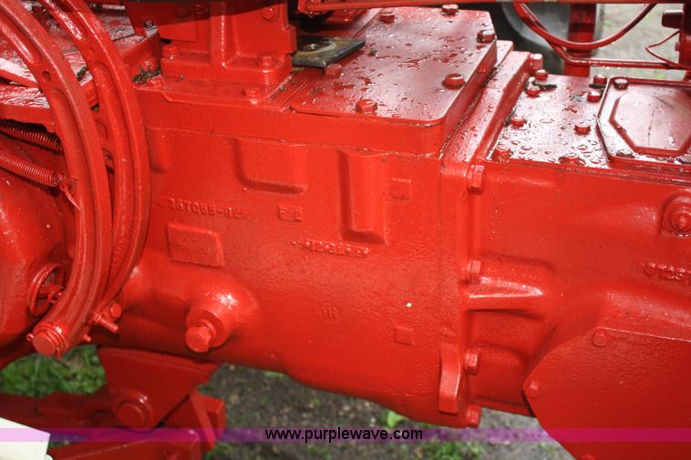 image for item 5075 International Farmall 560 tractor with loader