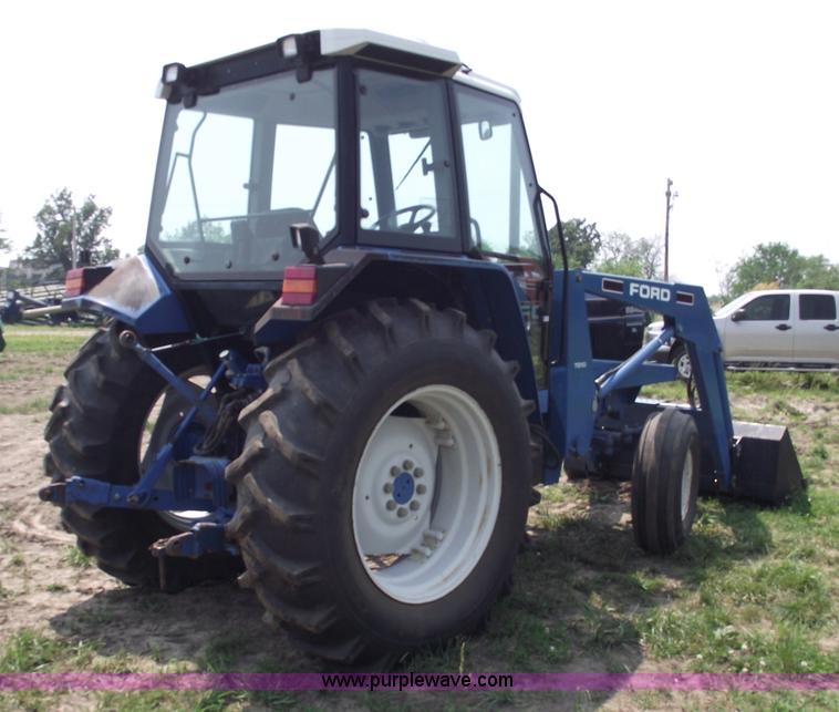 image for item 5402 1993 Ford 6640 tractor with loader