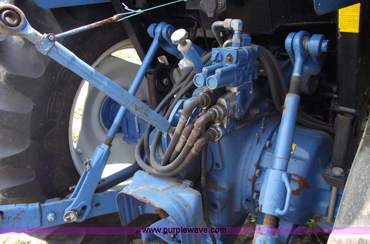 image for item 5402 1993 Ford 6640 tractor with loader