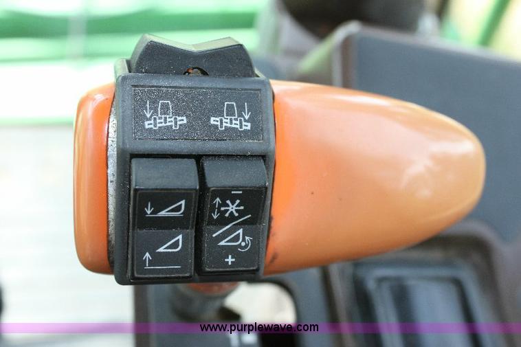 image for item 6869 2001 John Deere 4990 self propelled swather