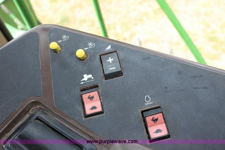 image for item 6869 2001 John Deere 4990 self propelled swather