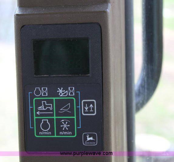 image for item 6869 2001 John Deere 4990 self propelled swather