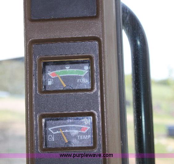 image for item 6869 2001 John Deere 4990 self propelled swather