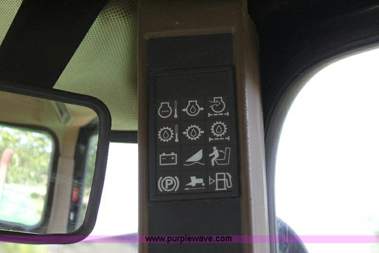 image for item 6869 2001 John Deere 4990 self propelled swather